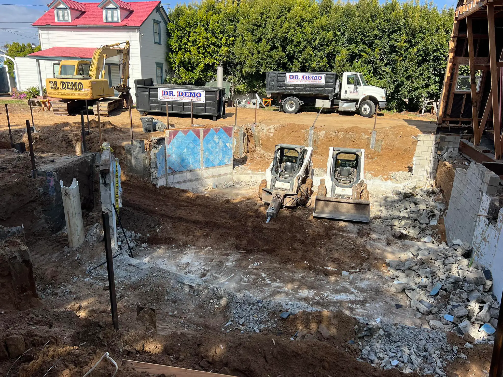 Dr Demo Dumpsters roll off dumpster at job site San Diego County CA